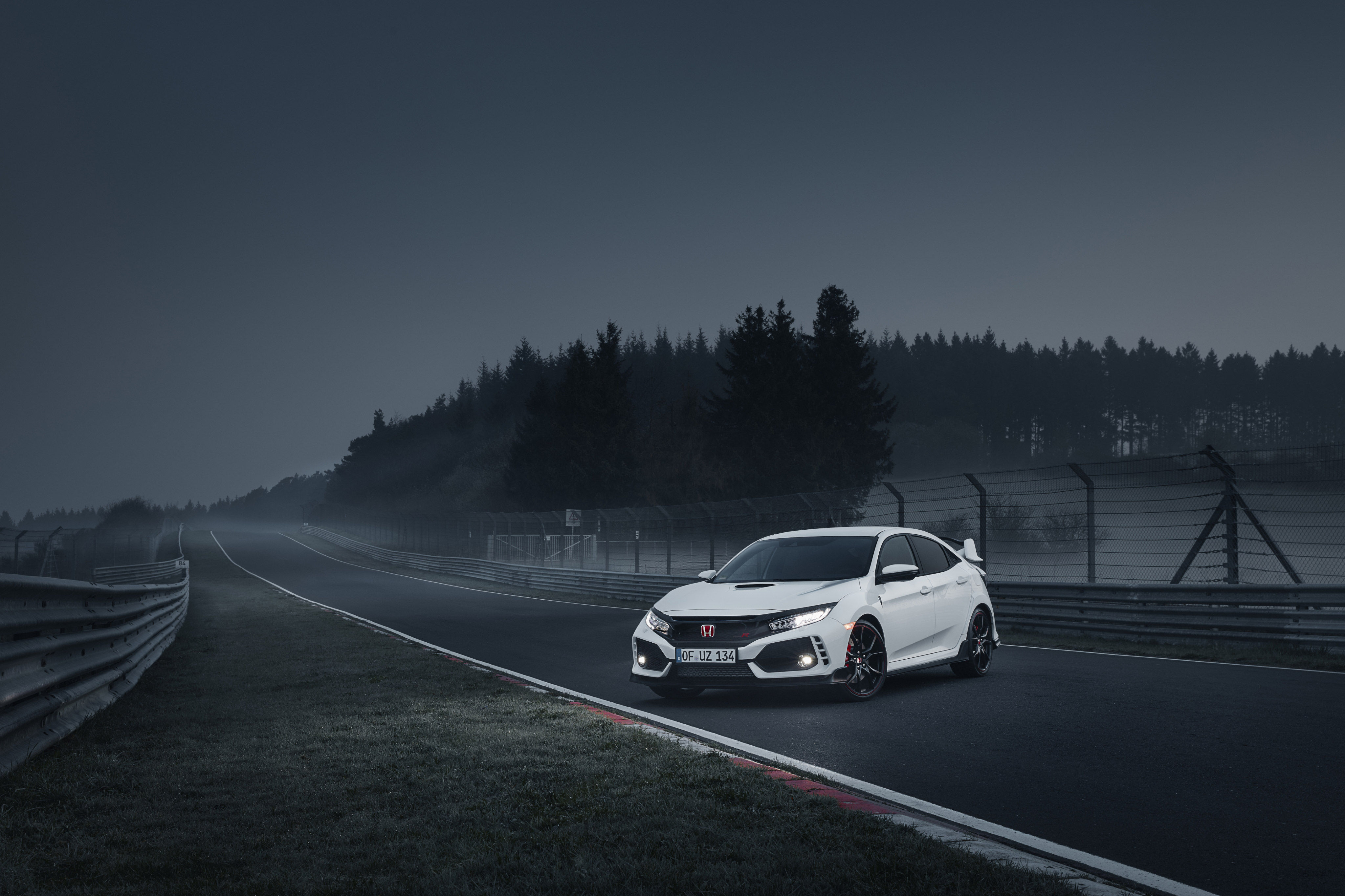 Wallpaper #r0U0l44B7YBJg1BVZKDq7 A White Honda Civic Type R Race Car on a Track at Night
