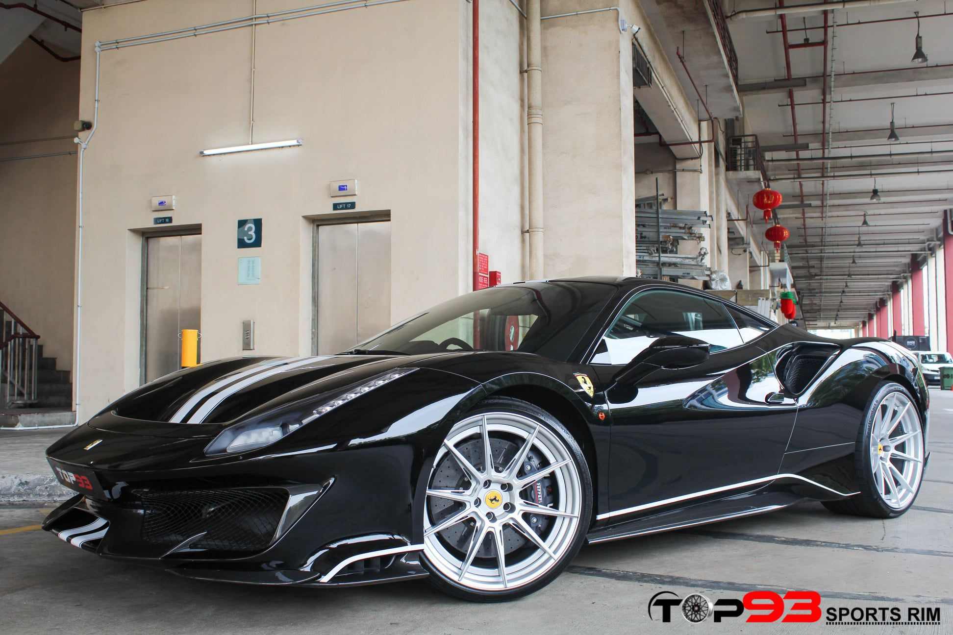 Wallpaper #cEVwoo4B7YBJg1BVF6Sg8 A Sleek Black Ferrari 488 Pista Parked in a Parking Garage