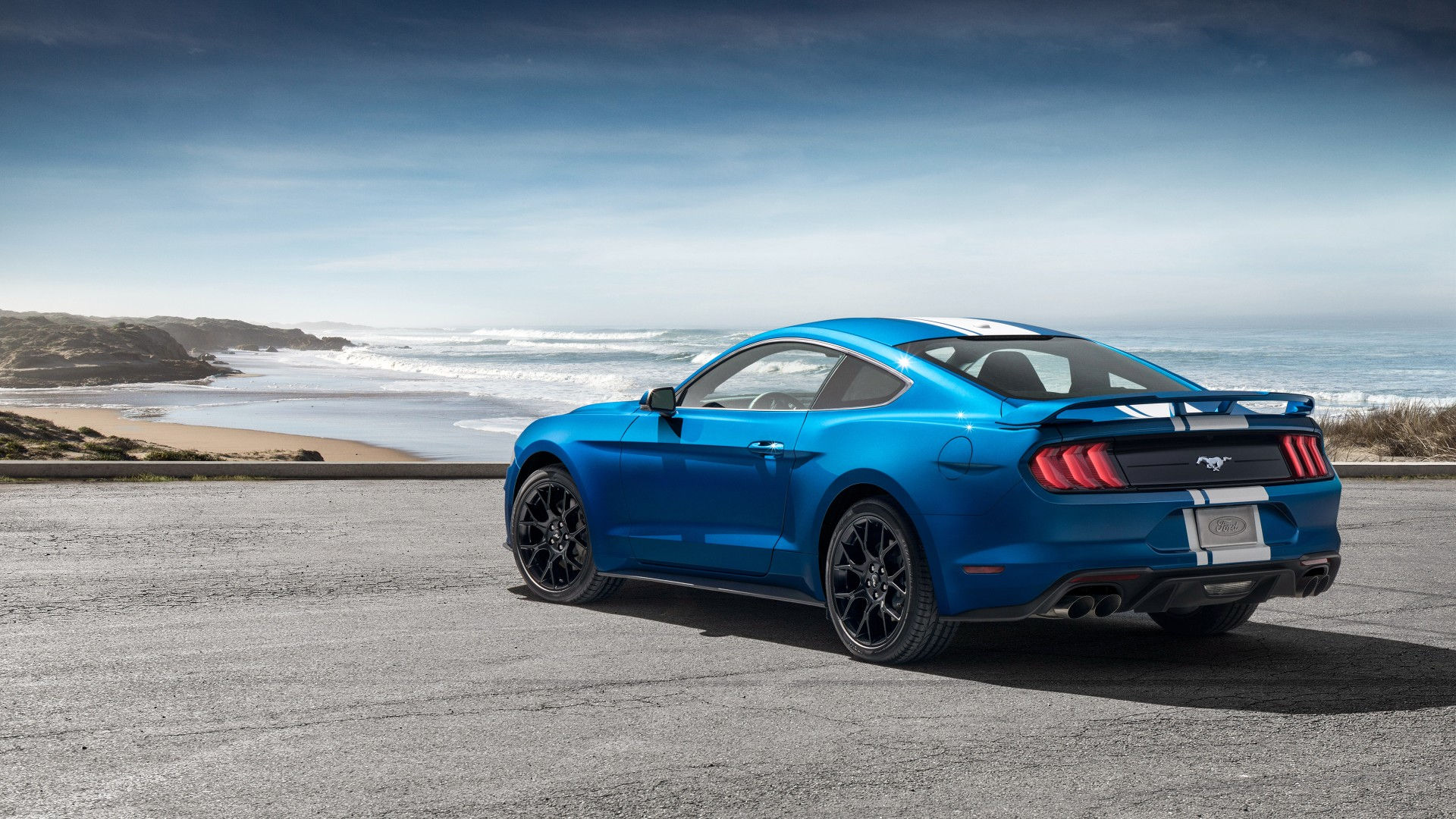Wallpaper #_kWjoY4B7YBJg1BVvqN815 Blue Ford Mustang Parked on a Coastal Road