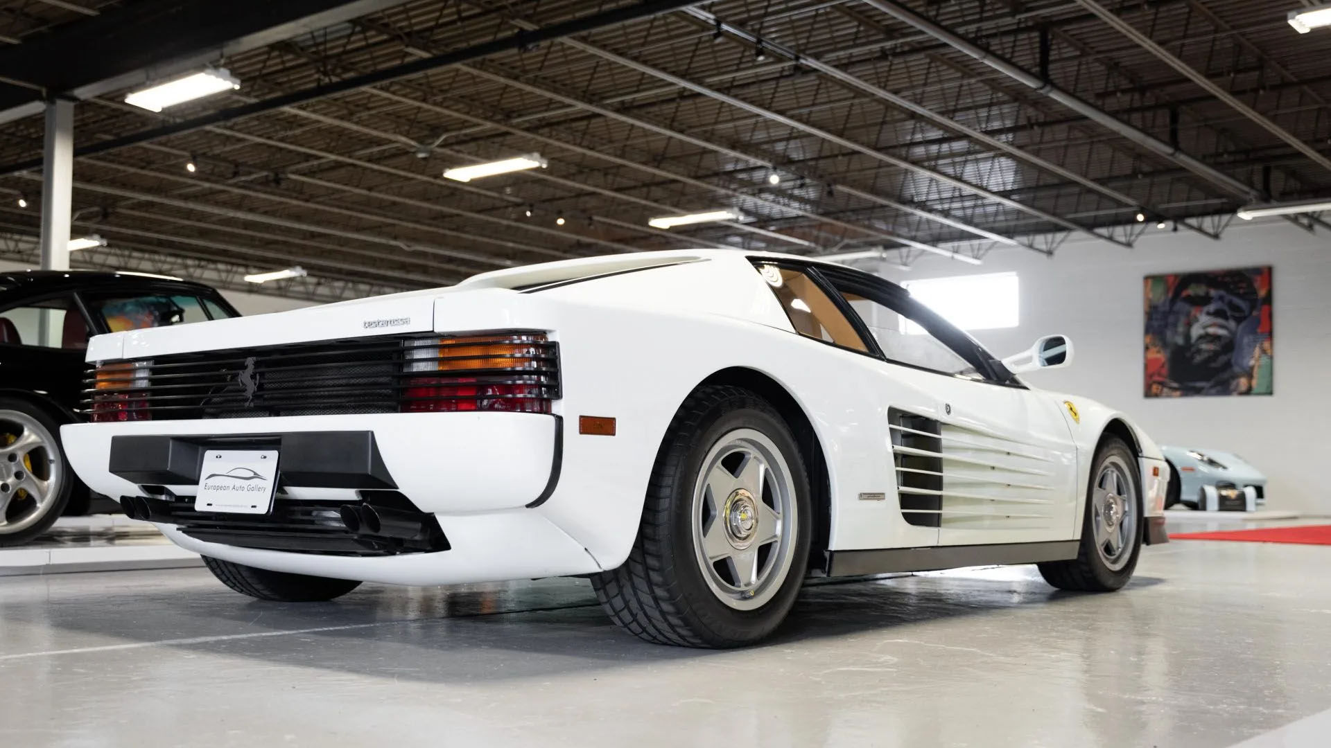 Wallpaper #L_AJf5cBi4JM6agGmiBh166 What Does a White Ferrari Testarossa Remind You of