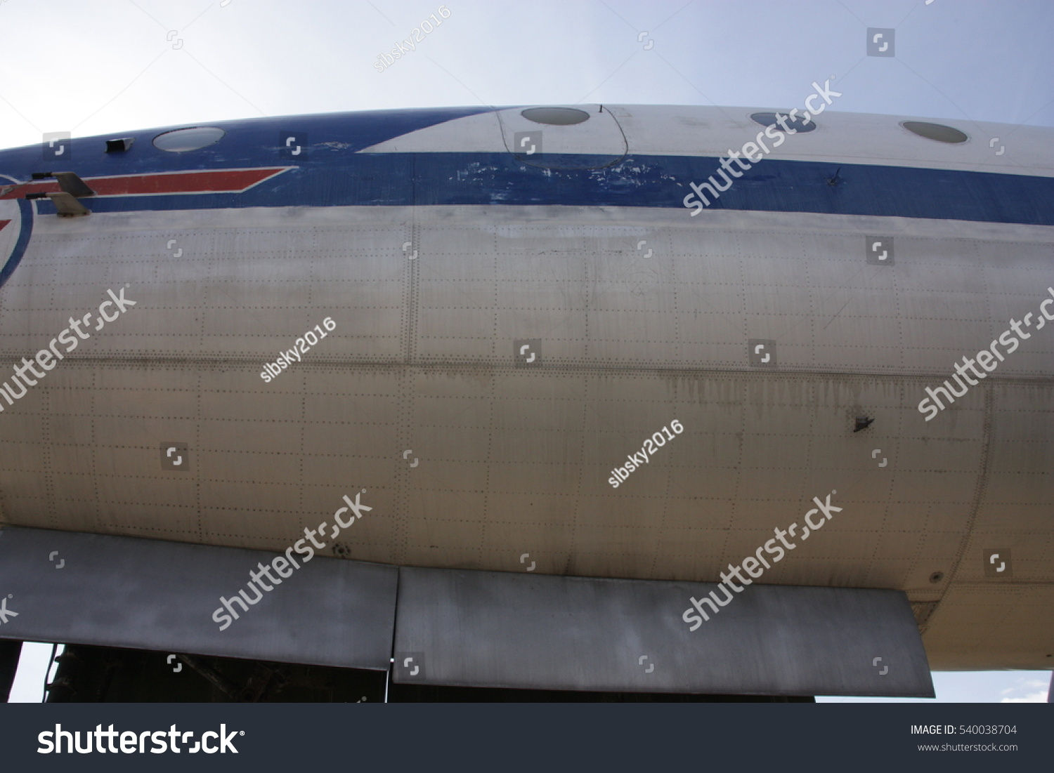 Wallpaper #8108e Fuselage Texture Sheet Metal on Aircraft Fuselage Backdrop Stock Photo