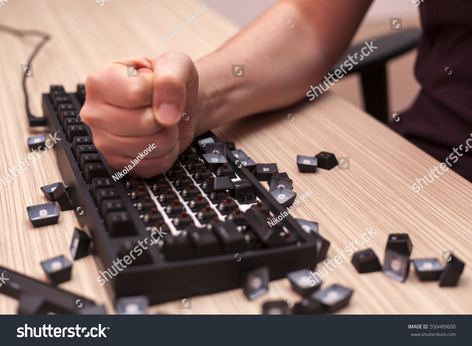 Wallpaper #p2fJ6JIBSpphPi3-wz7s2 Man Smashes Mechanical Computer Keyboard Rage Stock Photo 550489600