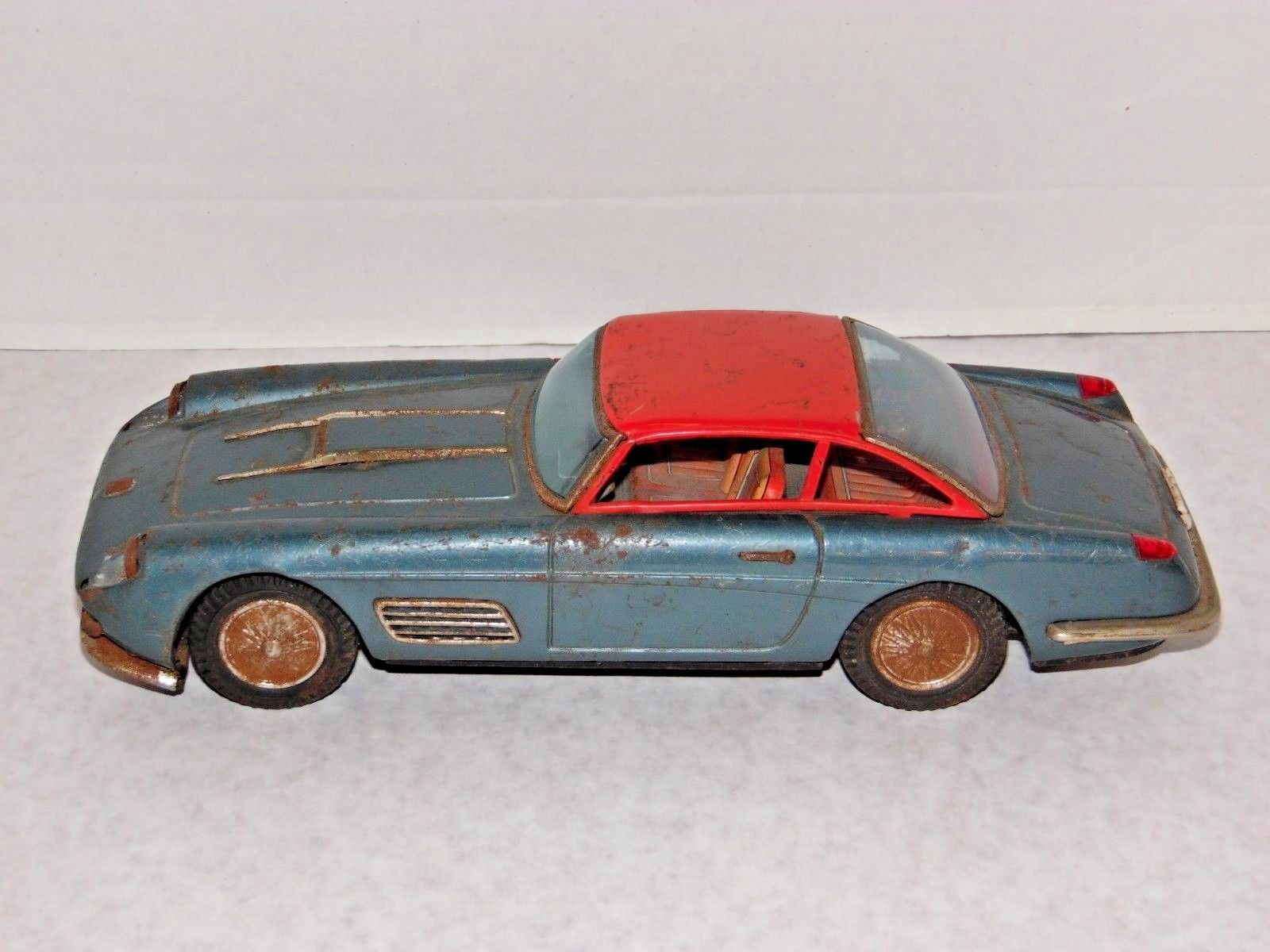 Wallpaper #O2fS_ZIBSpphPi3-u52G313 Vintage 1960s Tin Toy Car Bandai Ferrari Super America Made in Japan