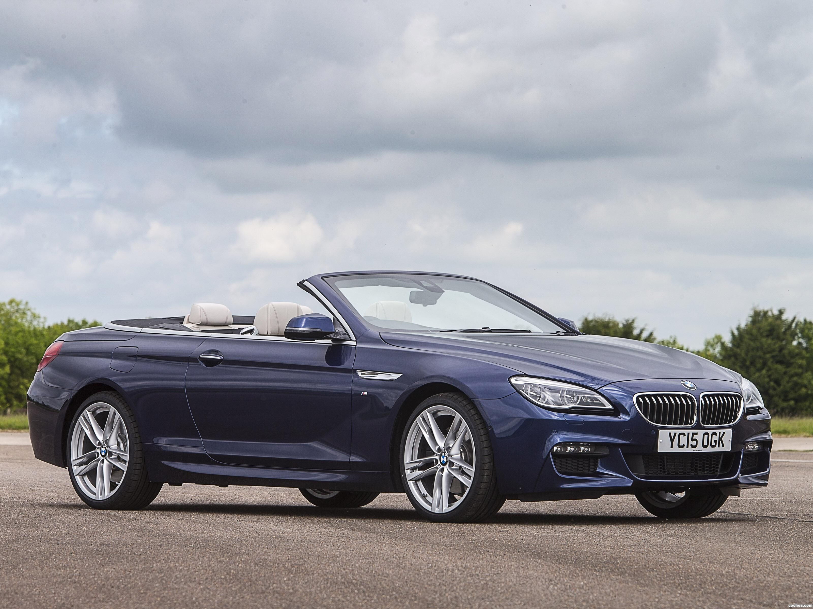 Wallpaper #VkVolo4B7YBJg1BVLqAC5 A Sleek Blue BMW 6 Series Gran Coupe