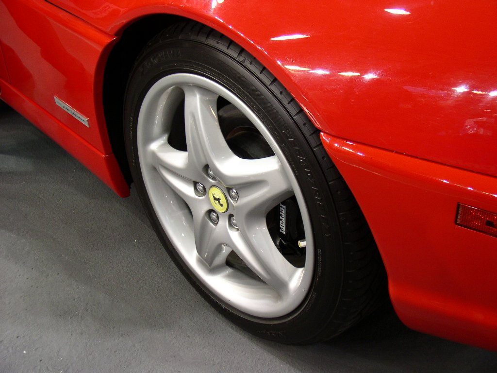 Wallpaper #1-oyVZMBlwTYPL18sAwP315 Ferrari Wheels Free Photo Download Freeimages