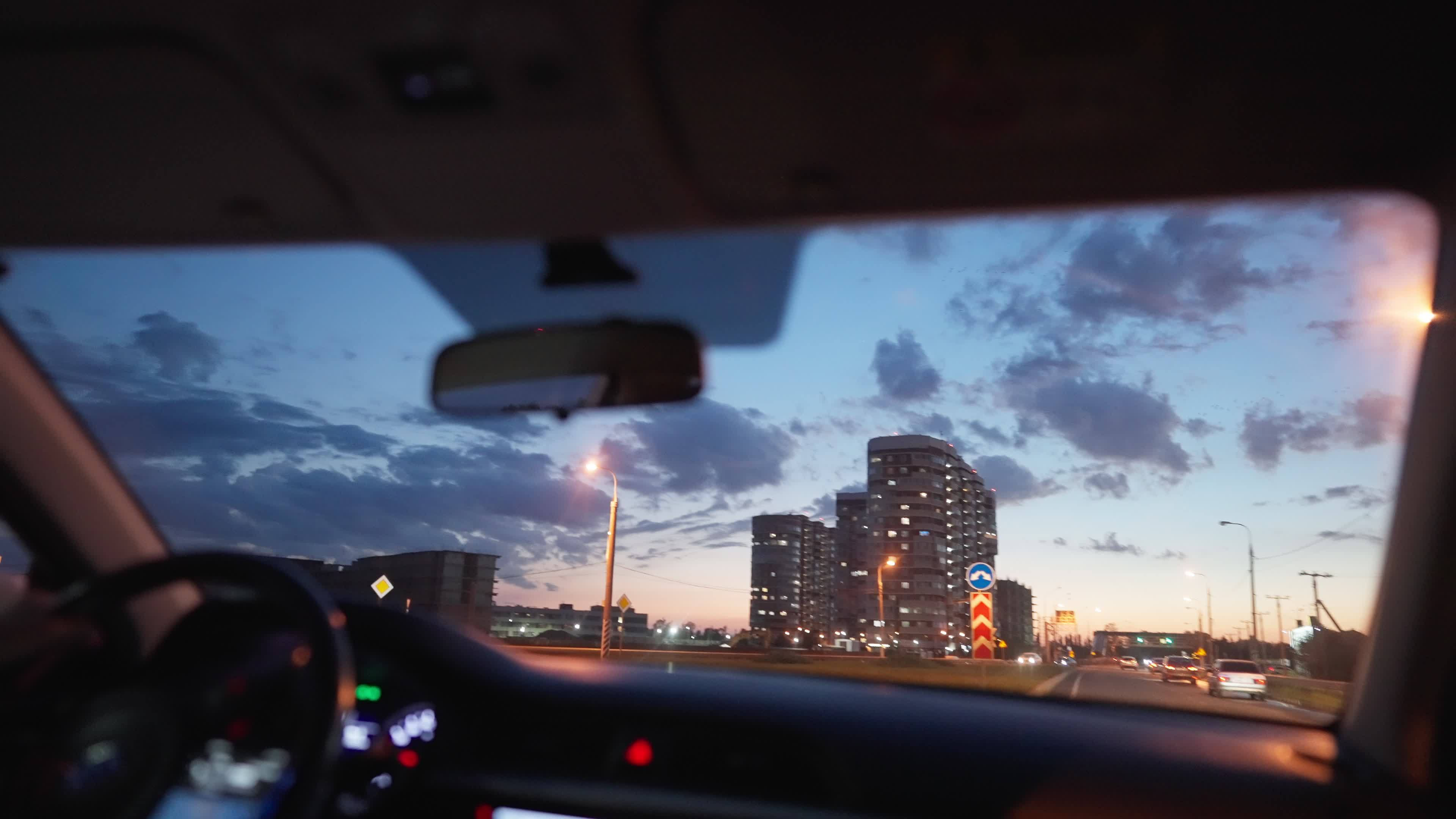 Wallpaper #VuoBU5MBlwTYPL18ogqa72 View from the Front Window of a Car Driving Along a Busy Highway
