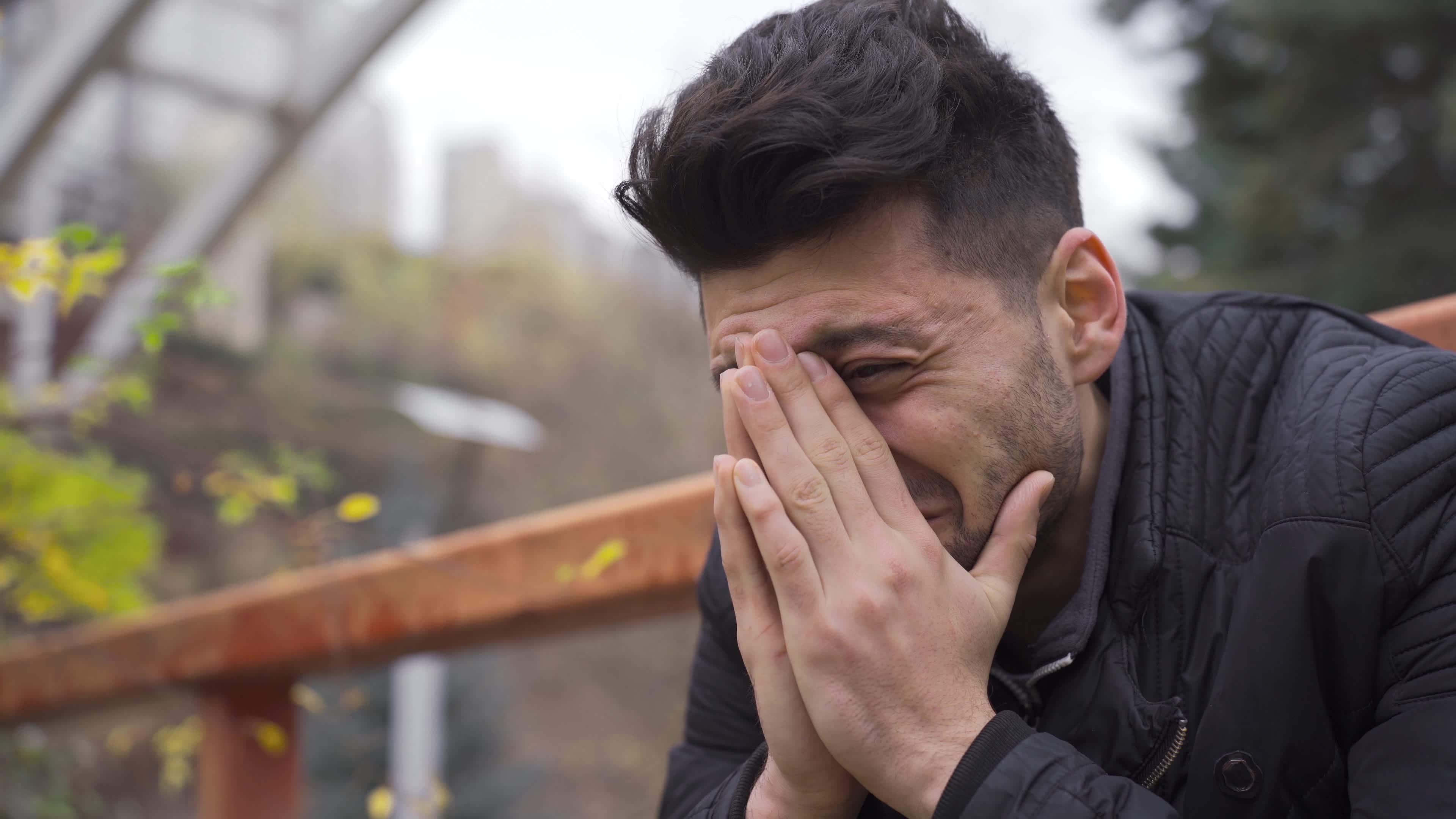 Wallpaper #q2eP65IBSpphPi3-00yX94 Sadness Loneliness the Young Man is Crying Outdoors and His Nerves