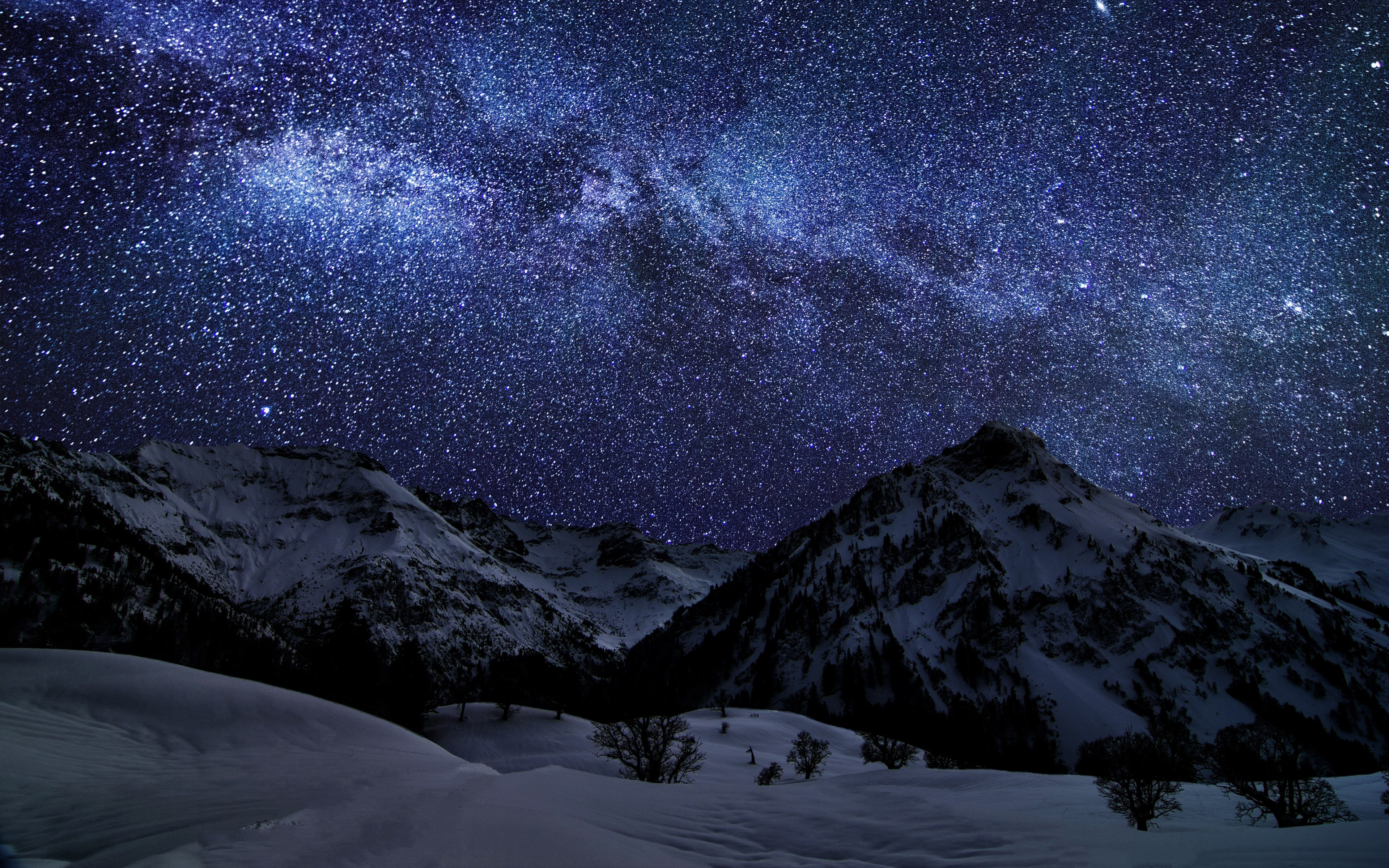 Wallpaper #s-9ES5MBMN-XEVvVNzoH195 Majestic Mountains Under Starry Skies 4K Ultra HD Wallpaper