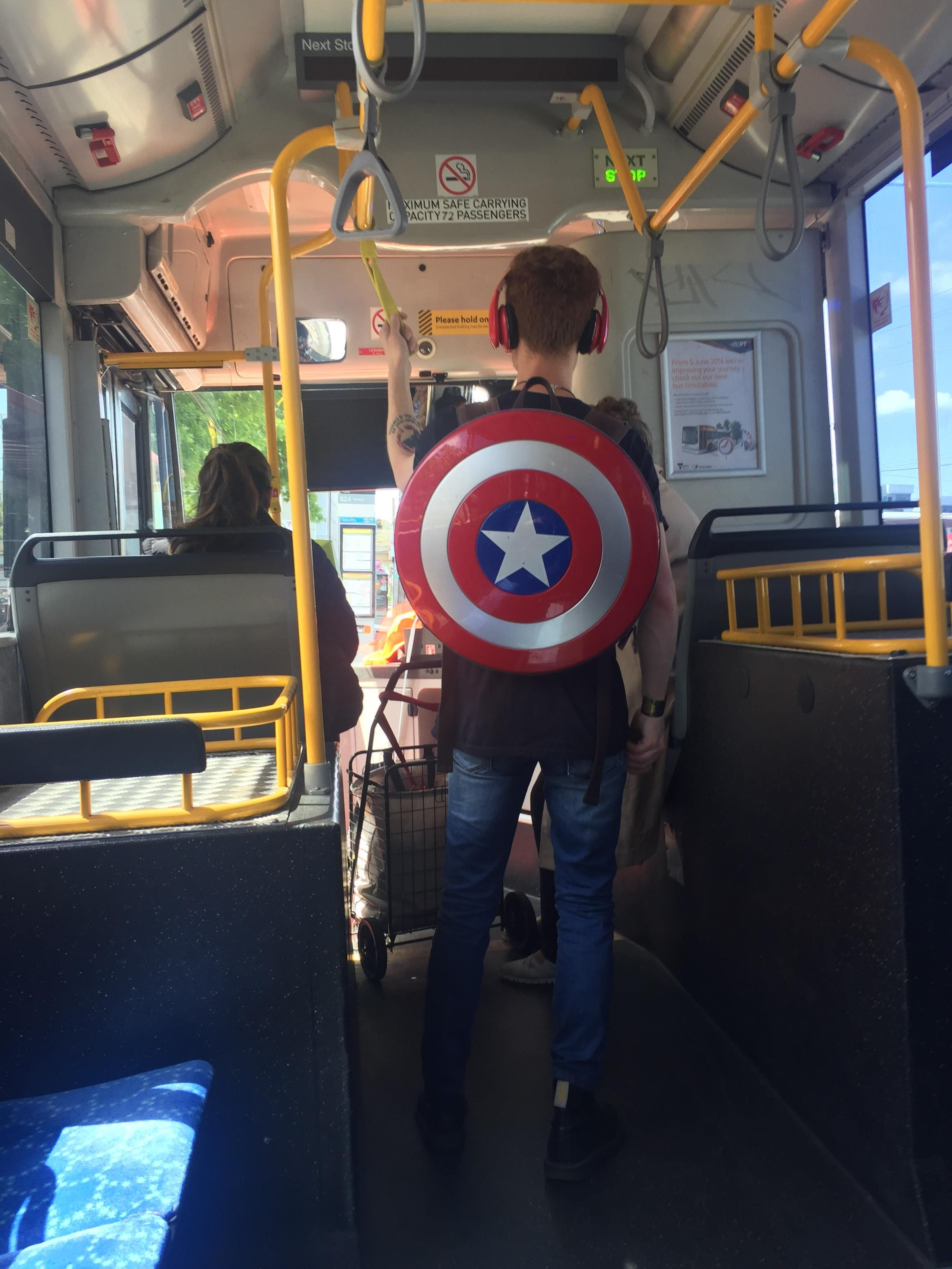 Wallpaper #4jG8NZMB5zzyi_yY2lc345 Man on Bus Has Captain America Shield Bag Rmildlyinteresting