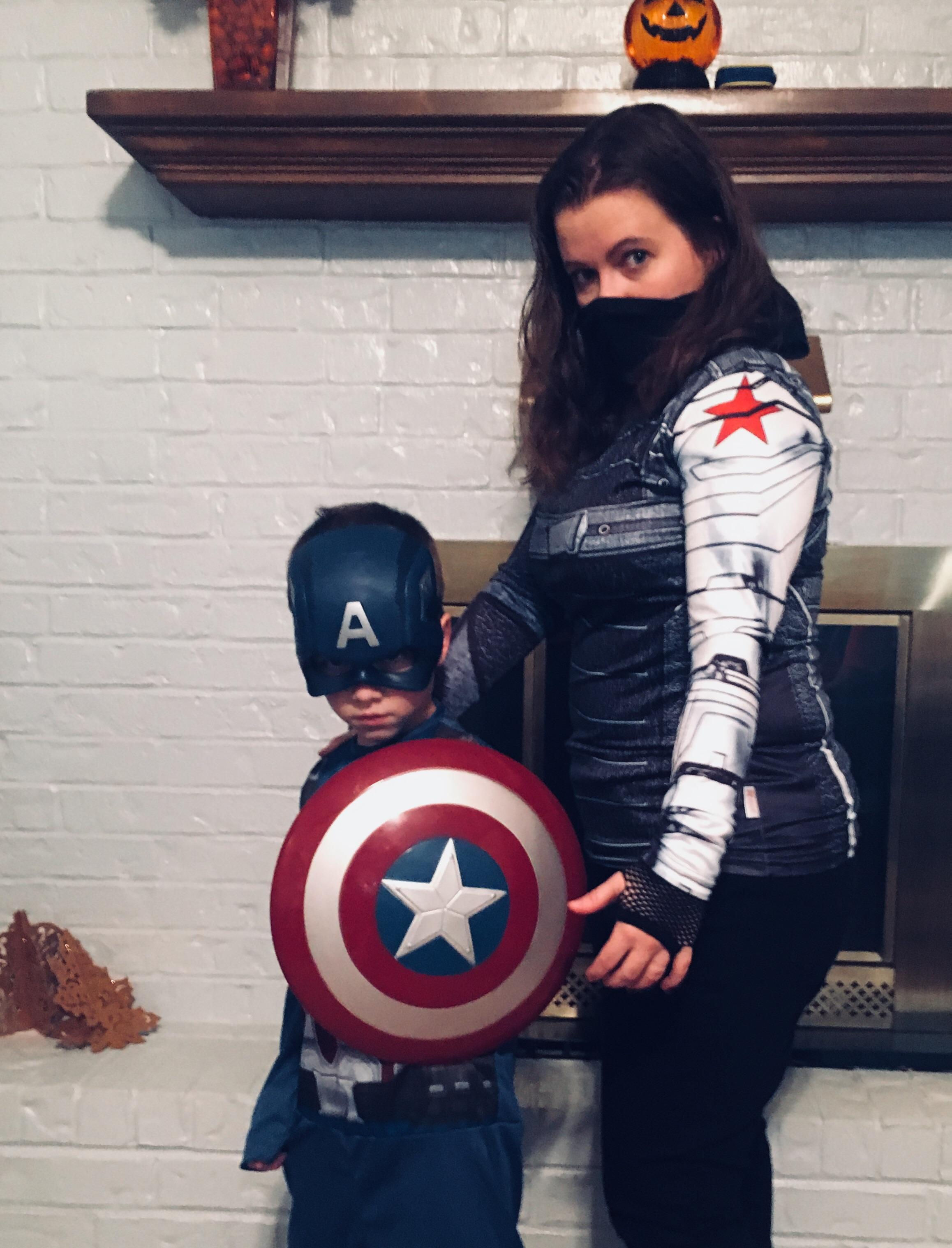 Wallpaper #UkUjno4B7YBJg1BVo6IZ3 A Mother and Her Son Dressed as Superheroes for Halloween