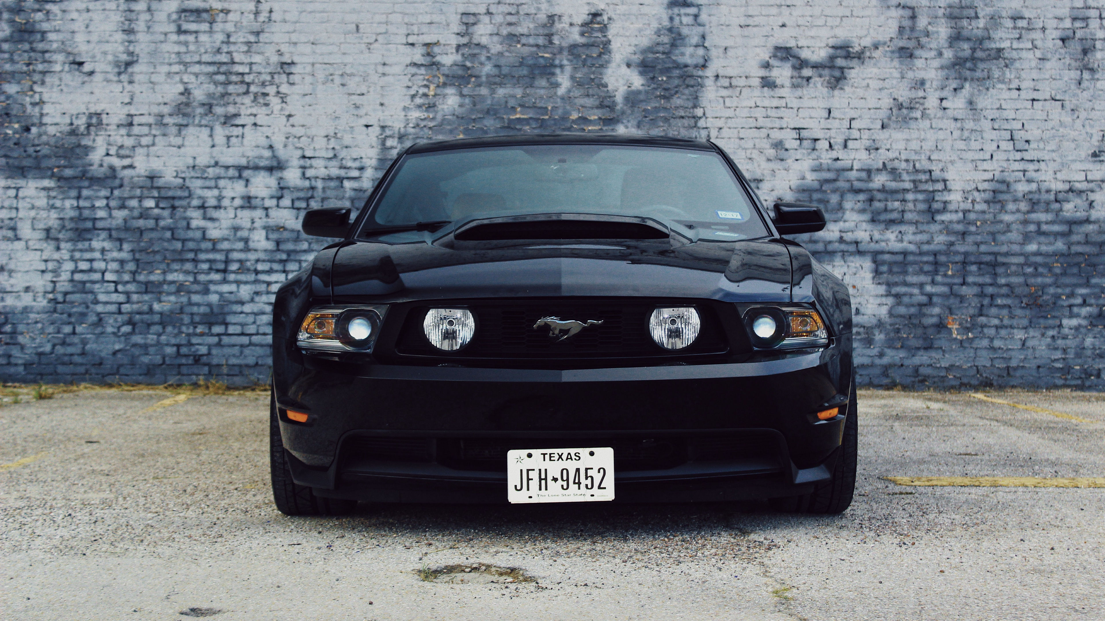 Wallpaper #_nQrw44B_8f4nGFaTm8O43 Ford Mustang Car Black Front View 4K