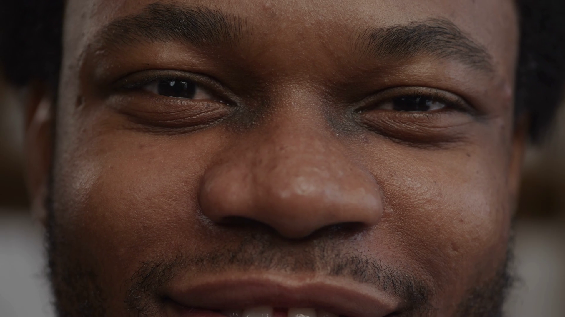 Wallpaper #IWf6_JIBSpphPi3-lZoB8 Extreme Close Up of a Black Mans Face Nodding His Head in Slow Motion