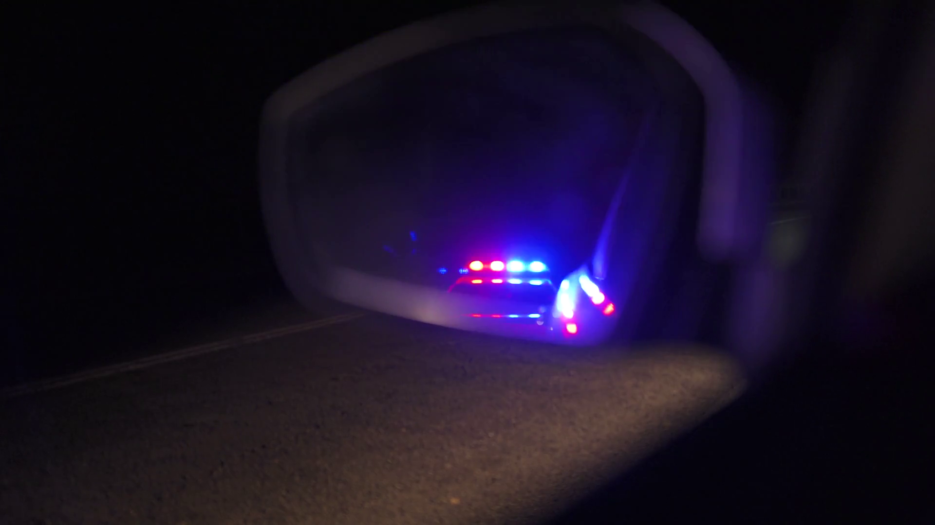 Wallpaper #sRmFFI8BtGB6xQ78JWih49 Flashing Police Lights Reflected in Rearview Stock Footage Sbv