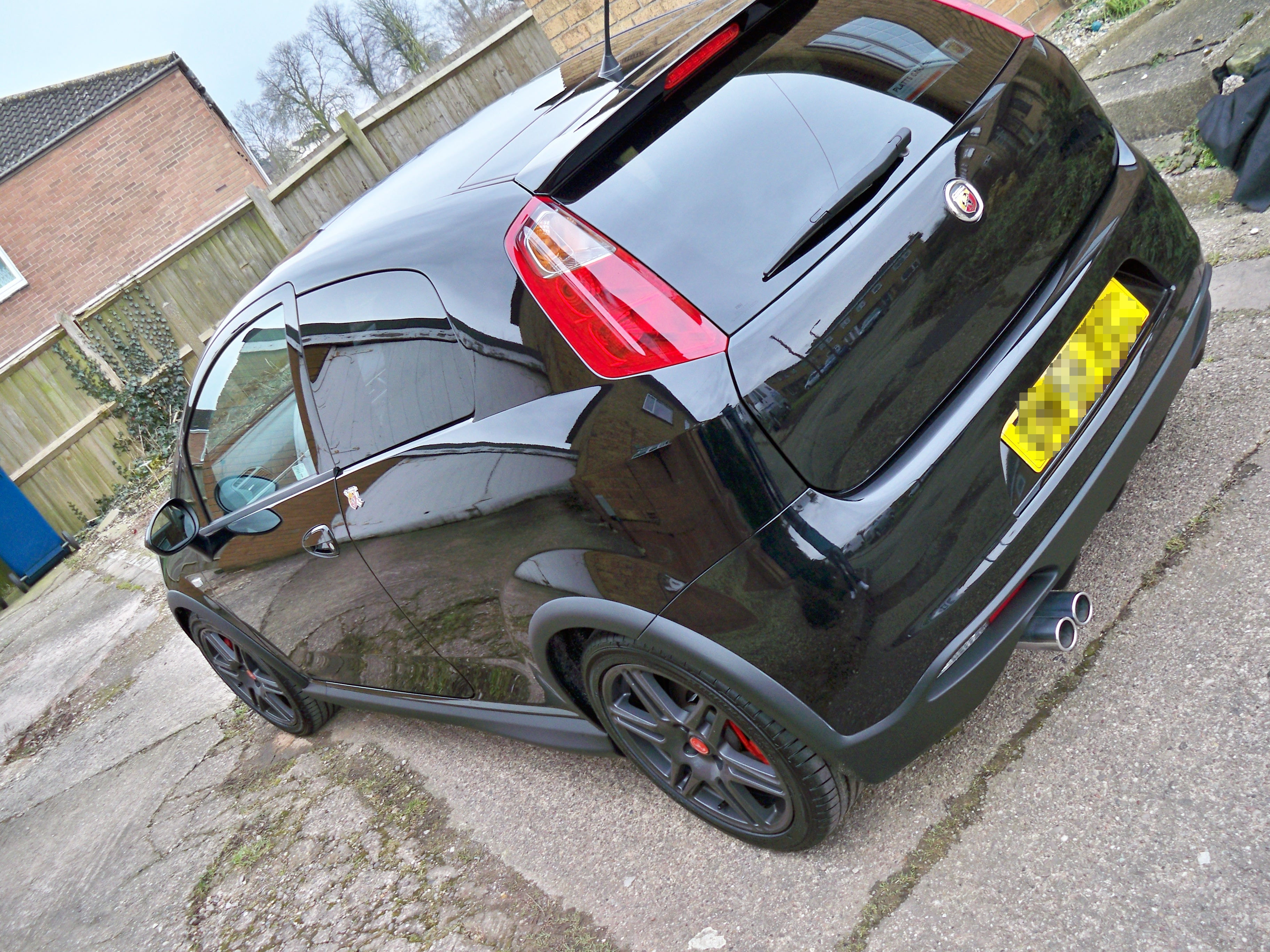 Wallpaper #a819a Front View of Black Fiat 500 Abarth Parked in the Street Editorial