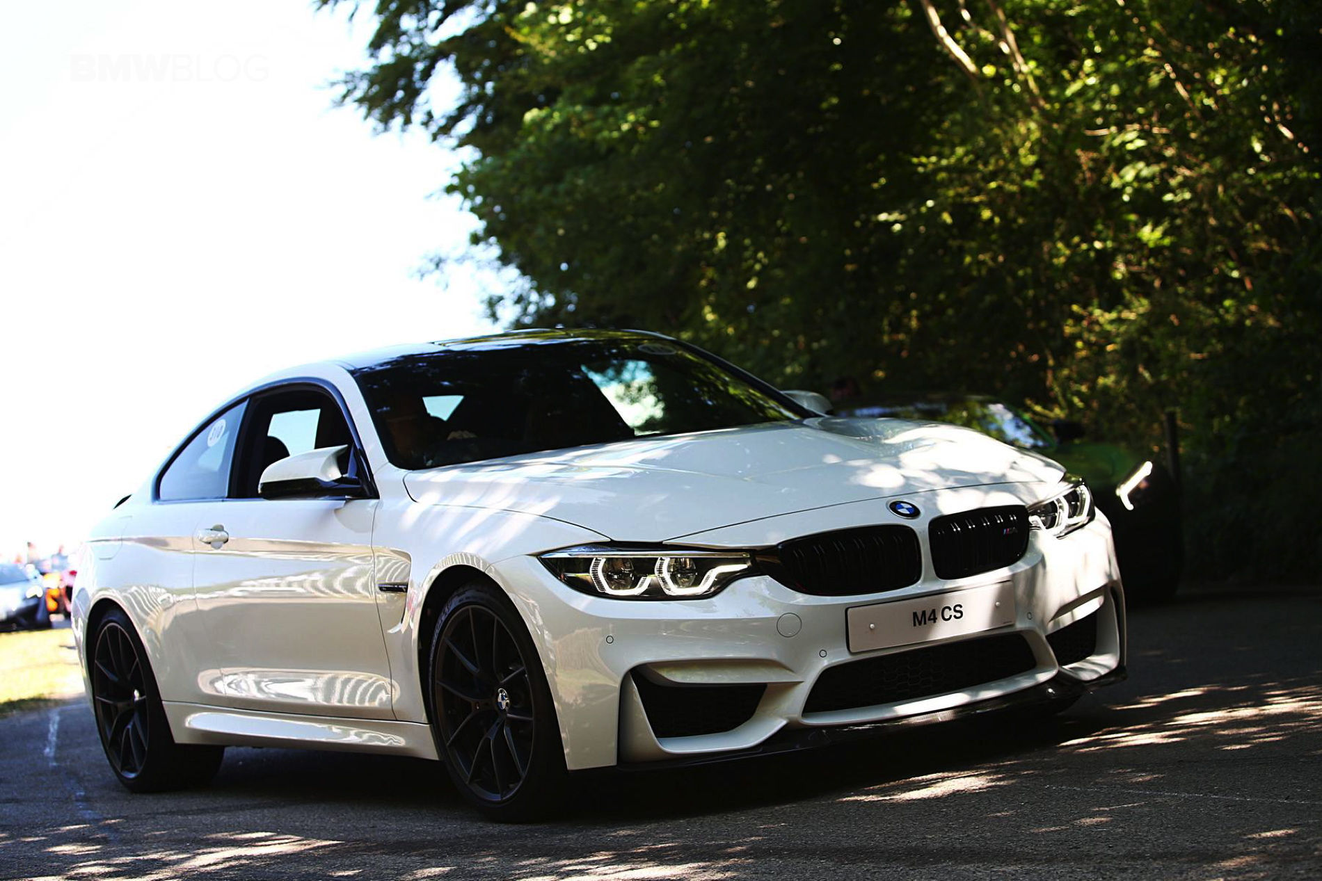 Wallpaper #9HMDgo4BFI5NbQks7BhO23 BMW M4 in Alpine White Drifts for Spectators at Goodwood