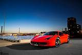 Wallpaper #YnP0fo4BFI5NbQksIxfN51 A Red Ferrari 458 Italia Parked on a Dock at Night