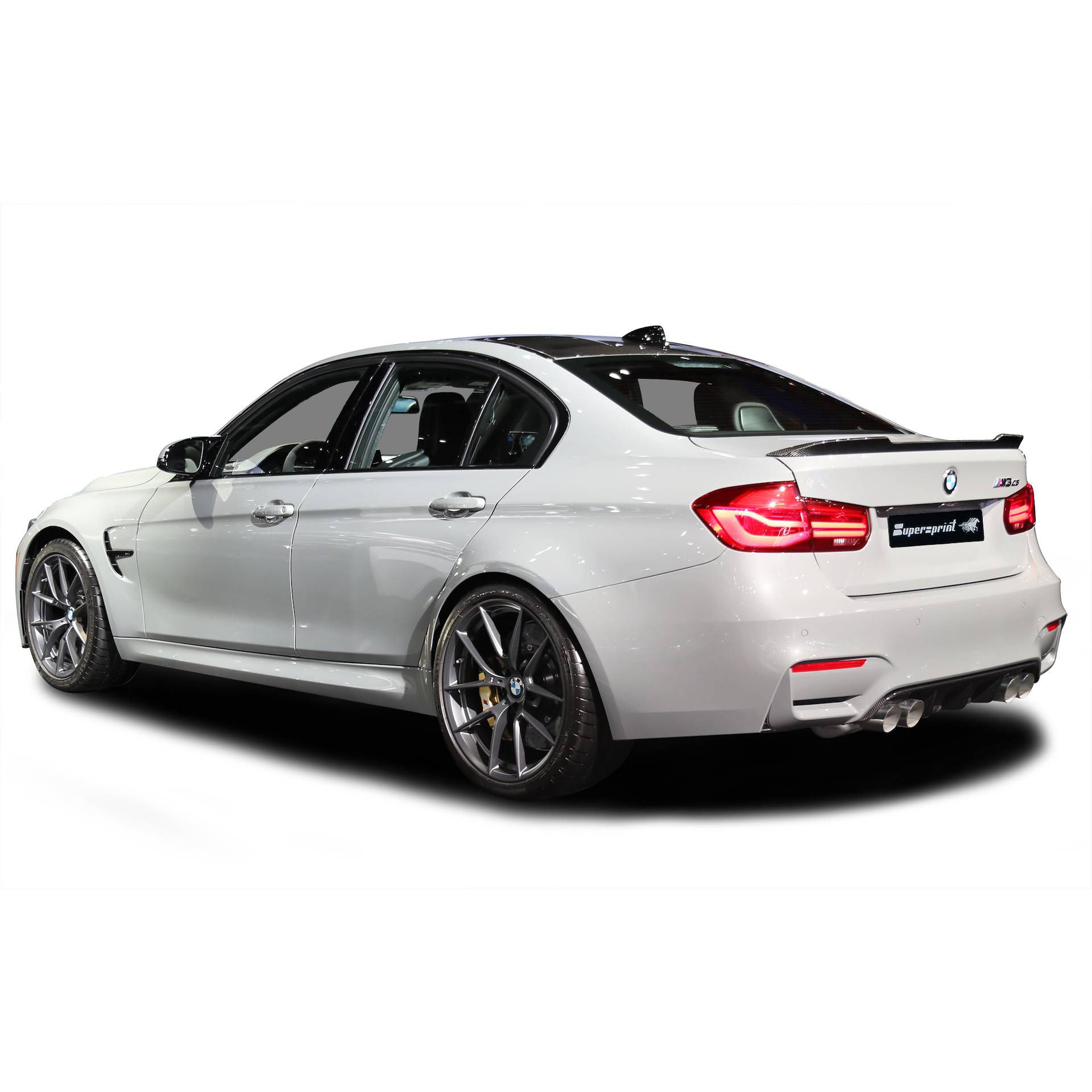 Wallpaper #QRU3t44BmMigT4Un71TH40 A Sleek Silver BMW M3 with a Carbon Fiber Spoiler