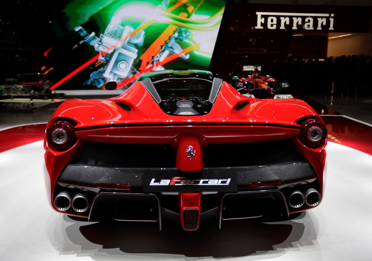 Wallpaper #IamqKZMBMYaX5LKBcdT320 The New Laferrari Hybrid Car is Uncovered on the Ferrari Stand During