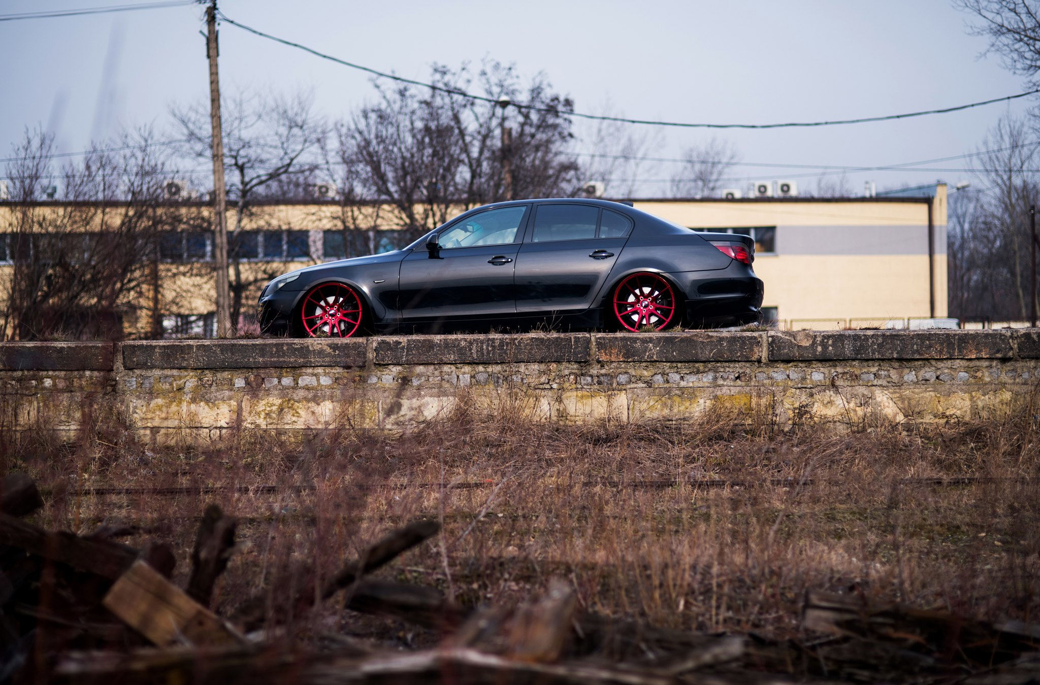 Wallpaper #zsYMM5MBVgN6TXj6lHeP10 Custom Red Jr Wheels as a Focal Point on Black BMW 5 Series Caridcom