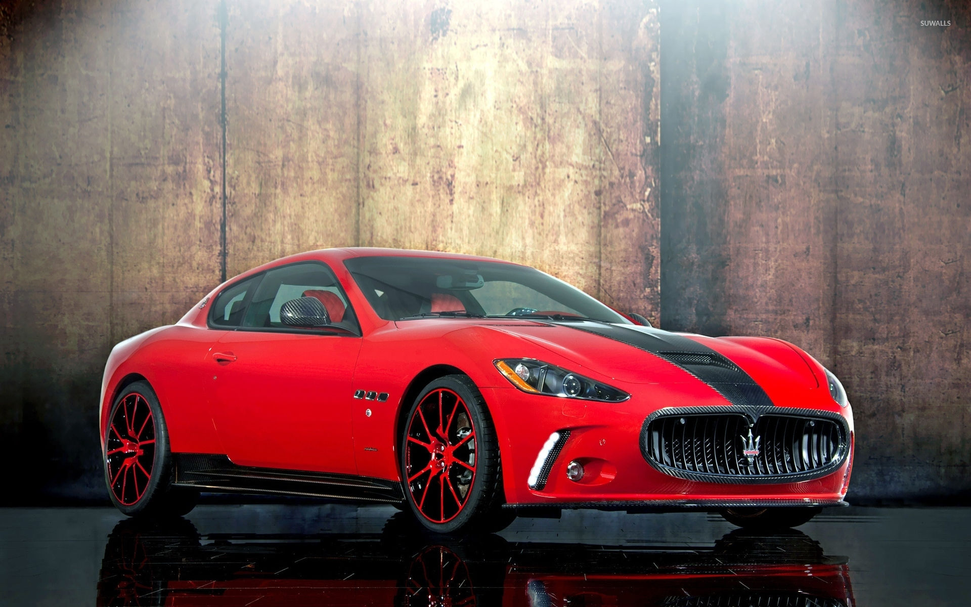 Wallpaper #kWidIpMBSpphPi3-uDN445 Front Side View of a Red Maserati Granturismo Wallpaper Car