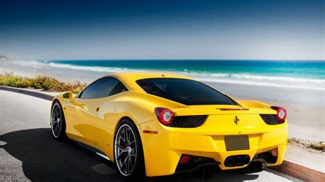 Wallpaper #YnP0fo4BFI5NbQksIxfN53 Yellow Ferrari 458 Italia Parked on a Coastal Road