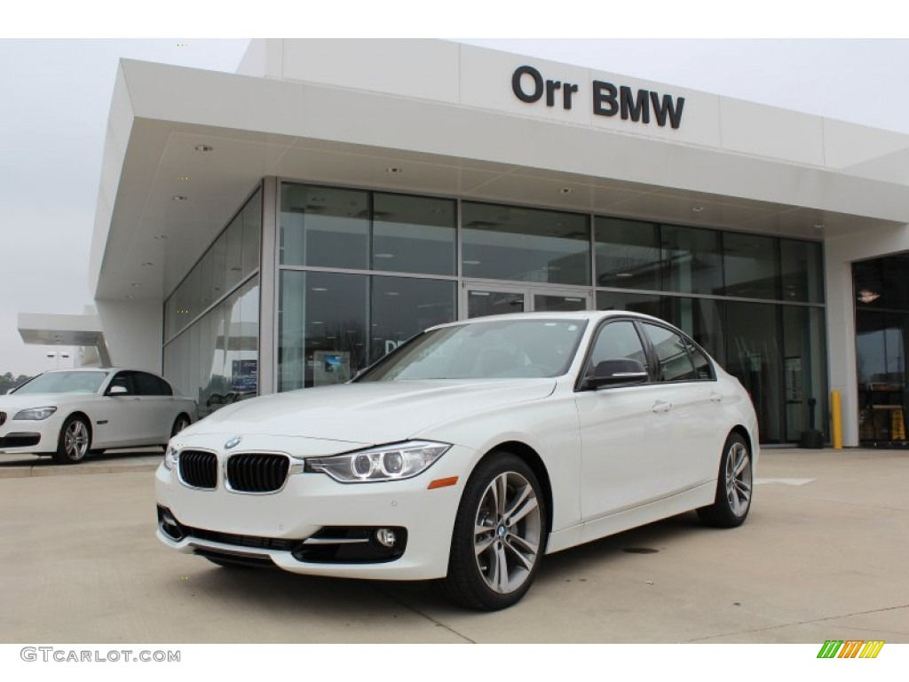 Wallpaper #9nMEgo4BFI5NbQksvxj_23 A Sleek White BMW 328i Parked in Front of a Dealership