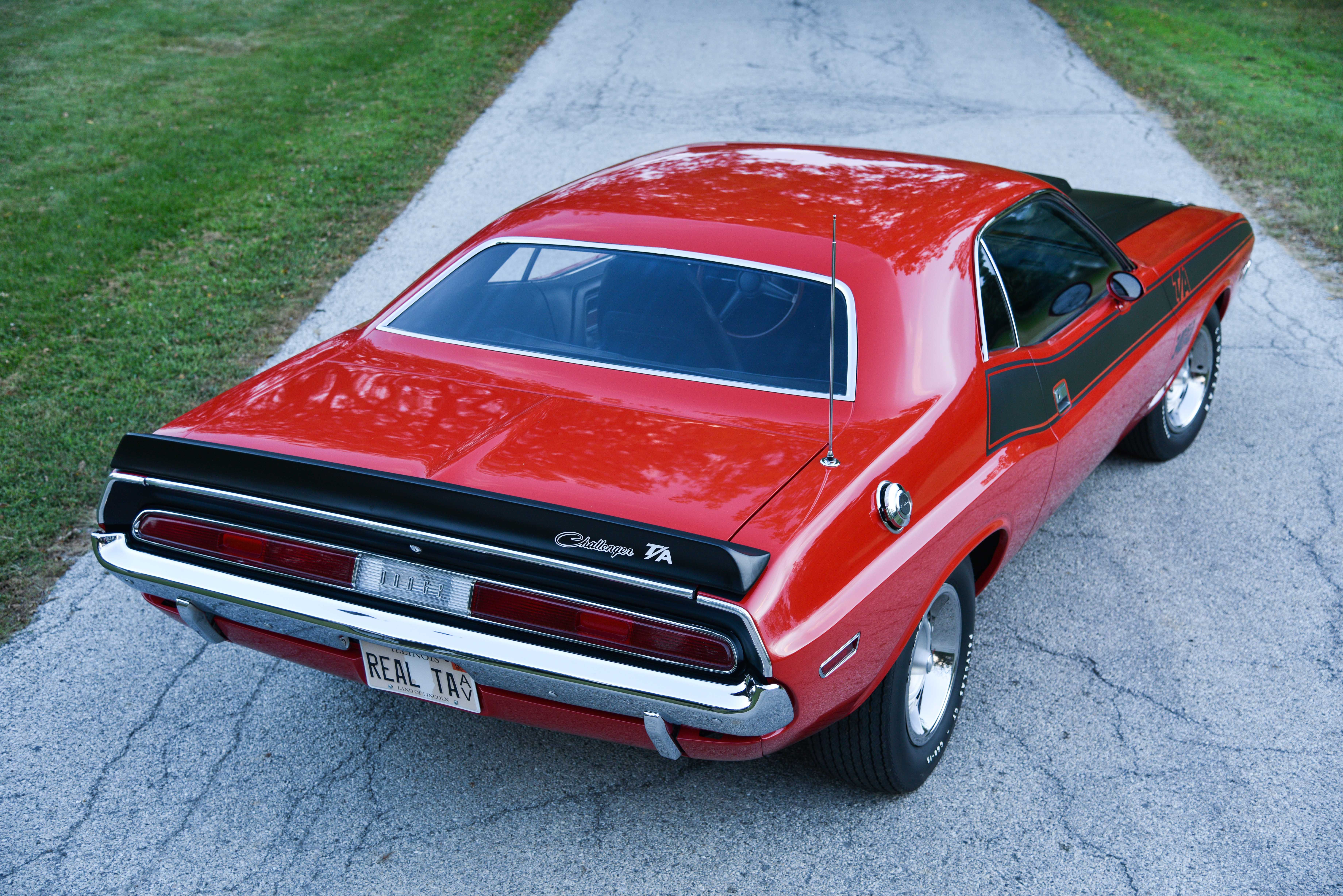 Wallpaper #ZHMQg44BFI5NbQks_xk236 A Red 1970 Plymouth Barracuda with a Black Vinyl Top