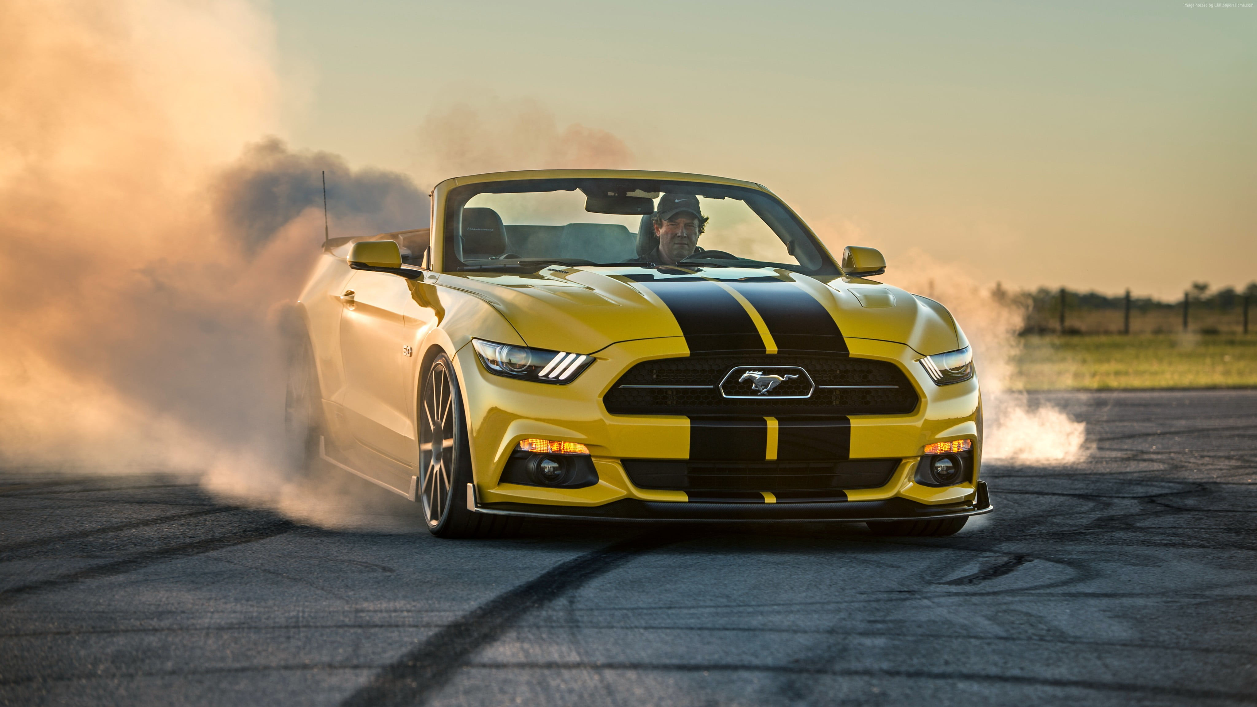 Wallpaper #qnRNxY4B_8f4nGFafnCp57 Man Riding Yellow Ford Mustang Convertible with Tires Screeching During