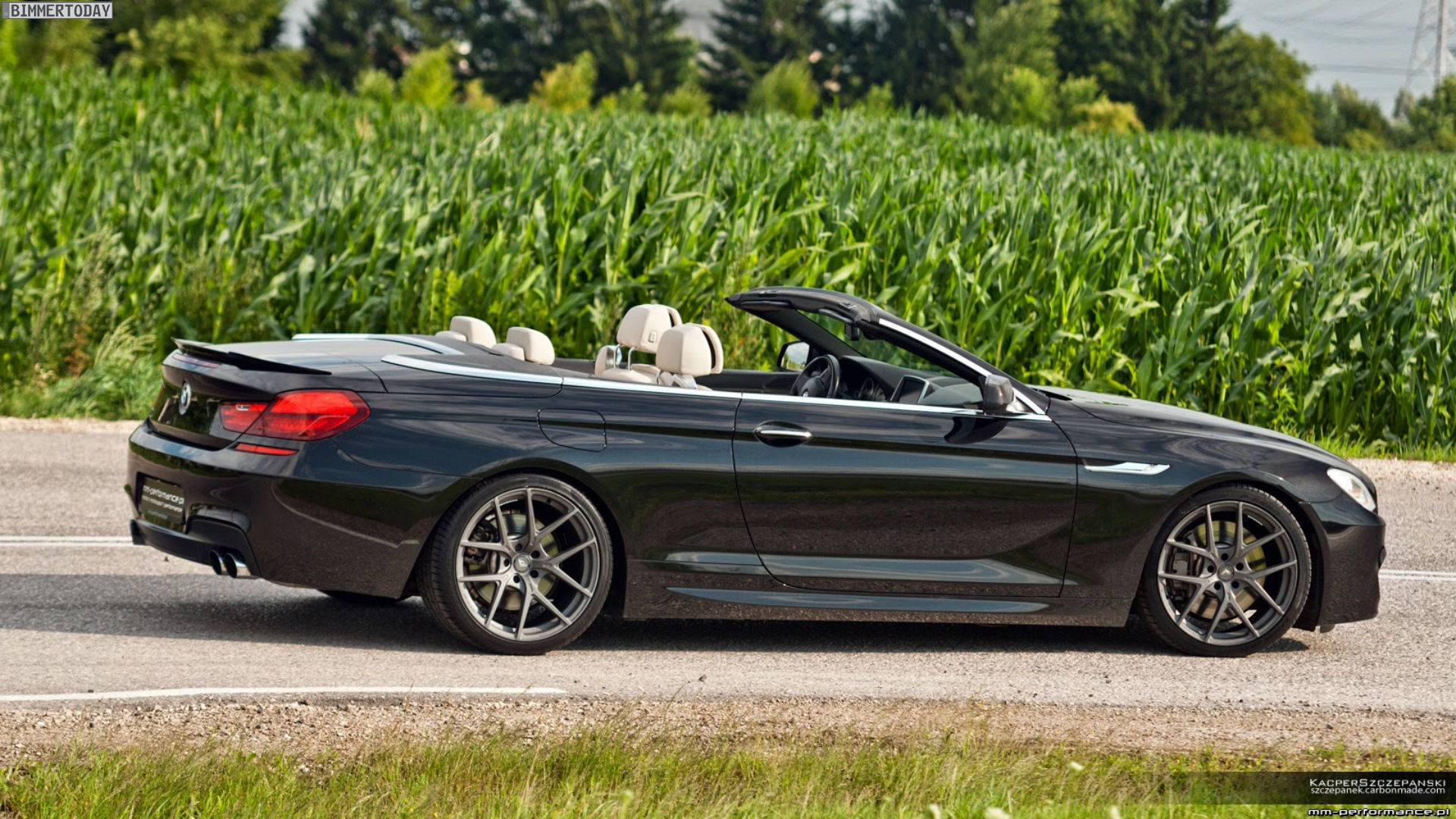 Wallpaper #VkVolo4B7YBJg1BVLqAC42 Black BMW M6 Gran Coupe Convertible on an Open Road