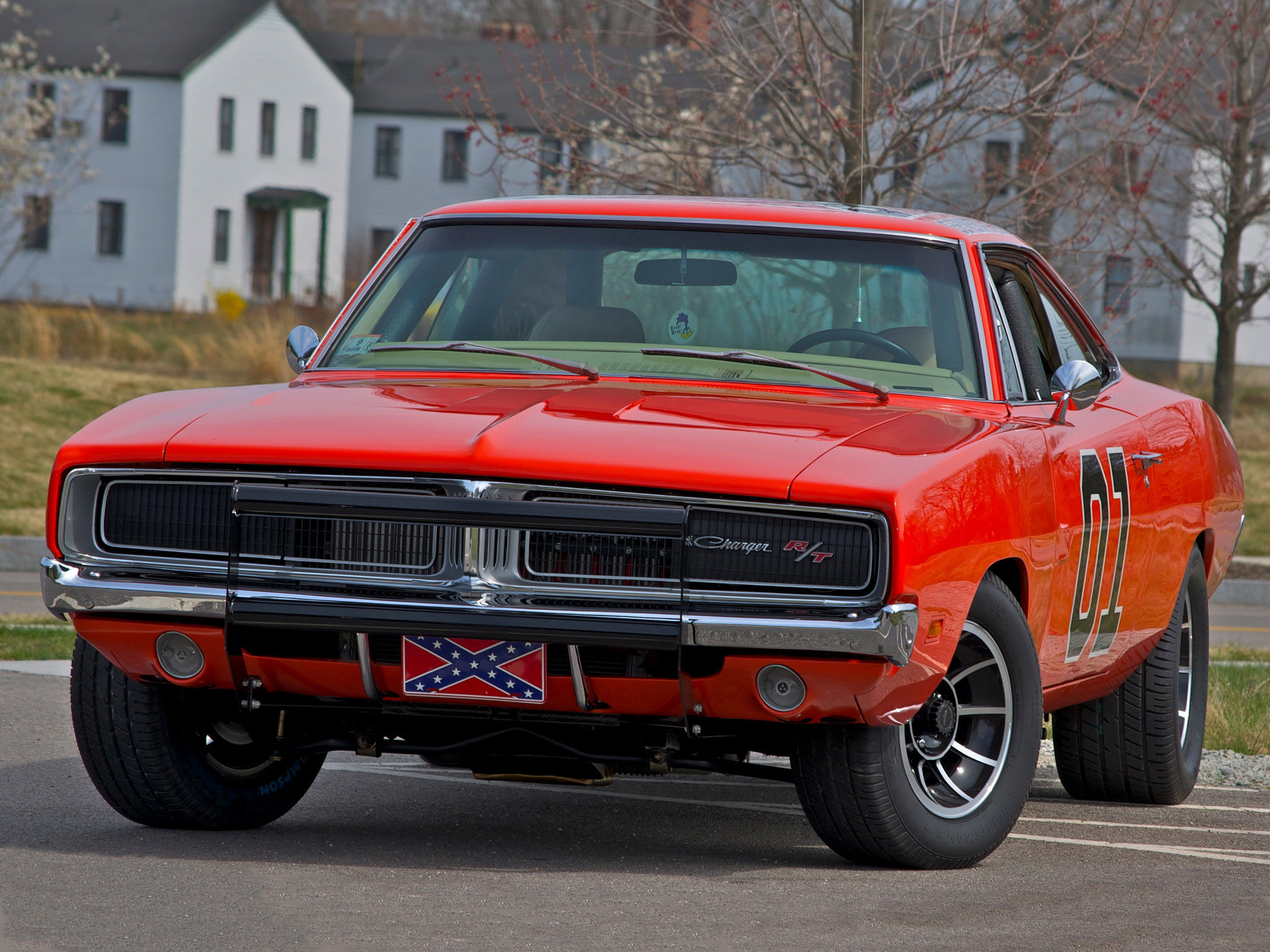 Wallpaper #lnOZg44BFI5NbQks9htG36 A Red 1969 Dodge Charger with the Confederate Flag Painted on the Front