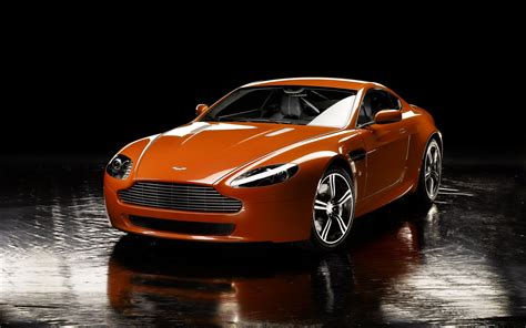 Wallpaper #C7CC9 A Sleek Orange Sports Car with a Carbon Fiber Front Splitter