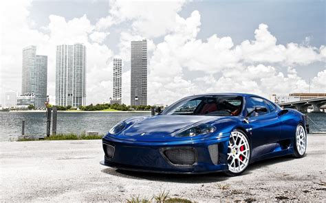 Wallpaper #YnP0fo4BFI5NbQksIxfN32 A Sleek Blue Ferrari F430 Parked on the Waterfront in Miami